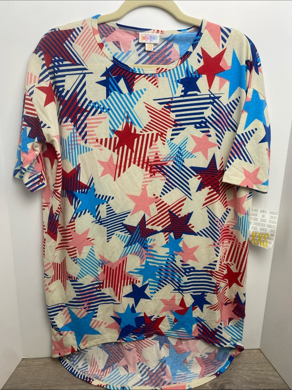 LuLaRoe Multicolor Star Print Tee - Cream, Red, Blue, Pink Irma